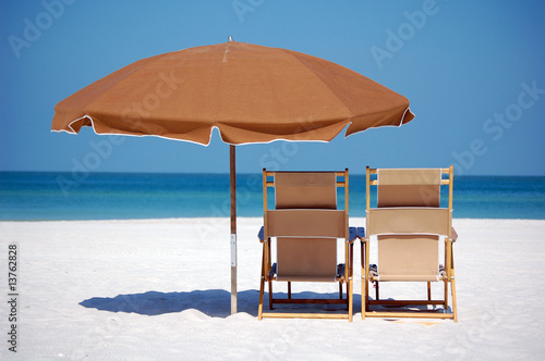 Beach umbrella / chairs