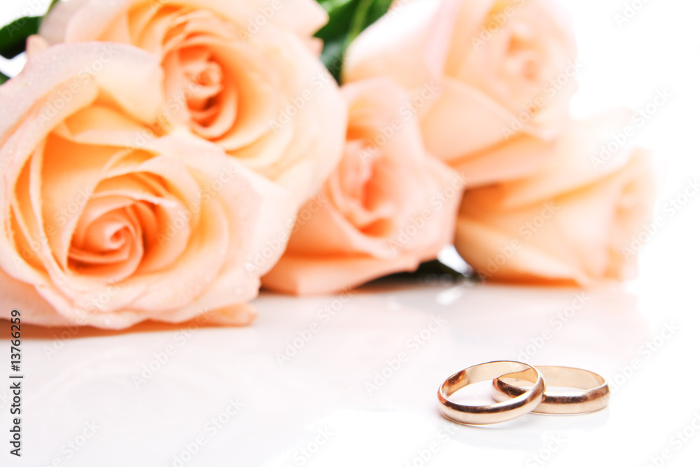 Wedding rings and roses