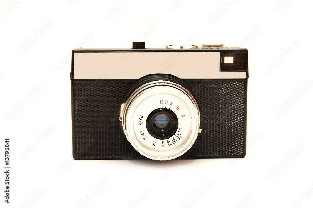 Old photo camera isolated over a white background Old photo camera isolated over a white background
