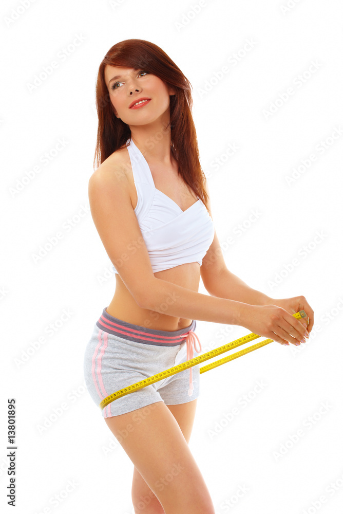 Smiling fit woman with measure tape. Smiling fit woman with measure tape.