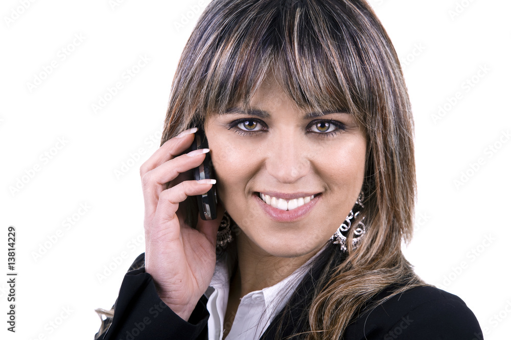 Beautiful, young woman speaking on the mobile phone Beautiful, young woman speaking on the mobile phone