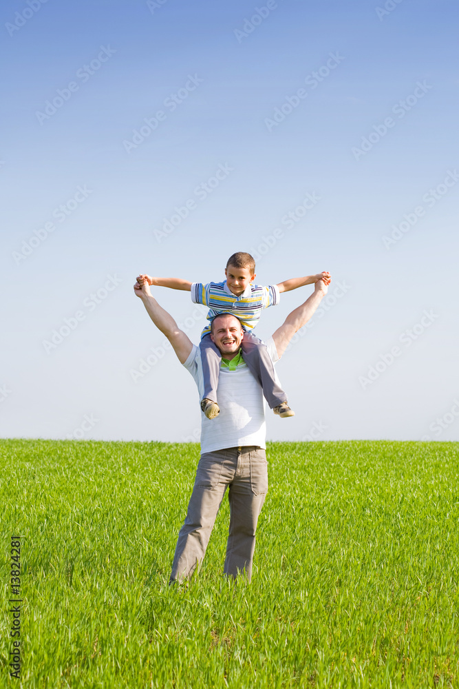 Father and son in a wheat field