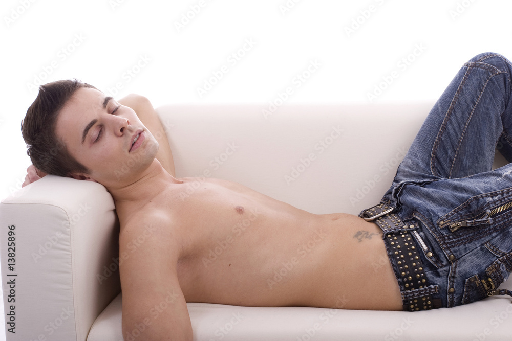Obraz premium Young boy sleeping on couch