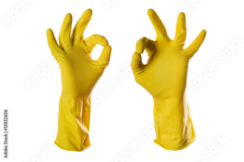 ok sign yellow rubber gloves on white with clipping path photo