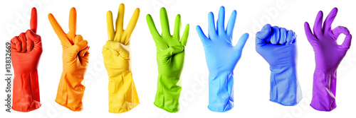 raibow color rubber gloves on white with clipping path photo