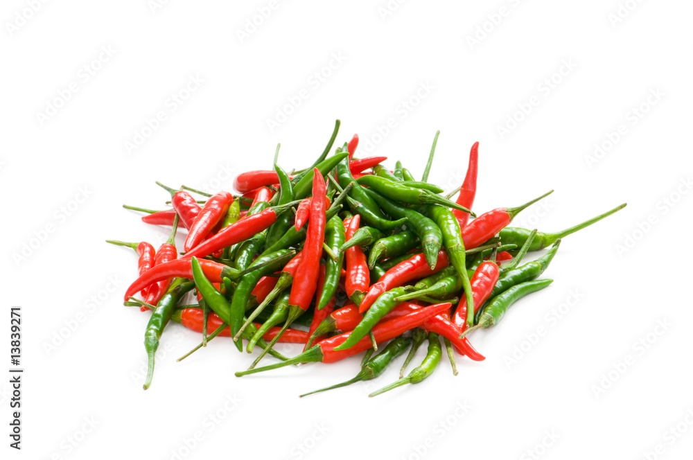 Red chili peppers isolated on the white Red chili peppers isolated on the white