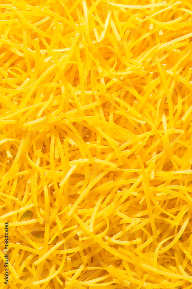 Extreme close up of yellow italian pasta Extreme close up of yellow italian pasta
