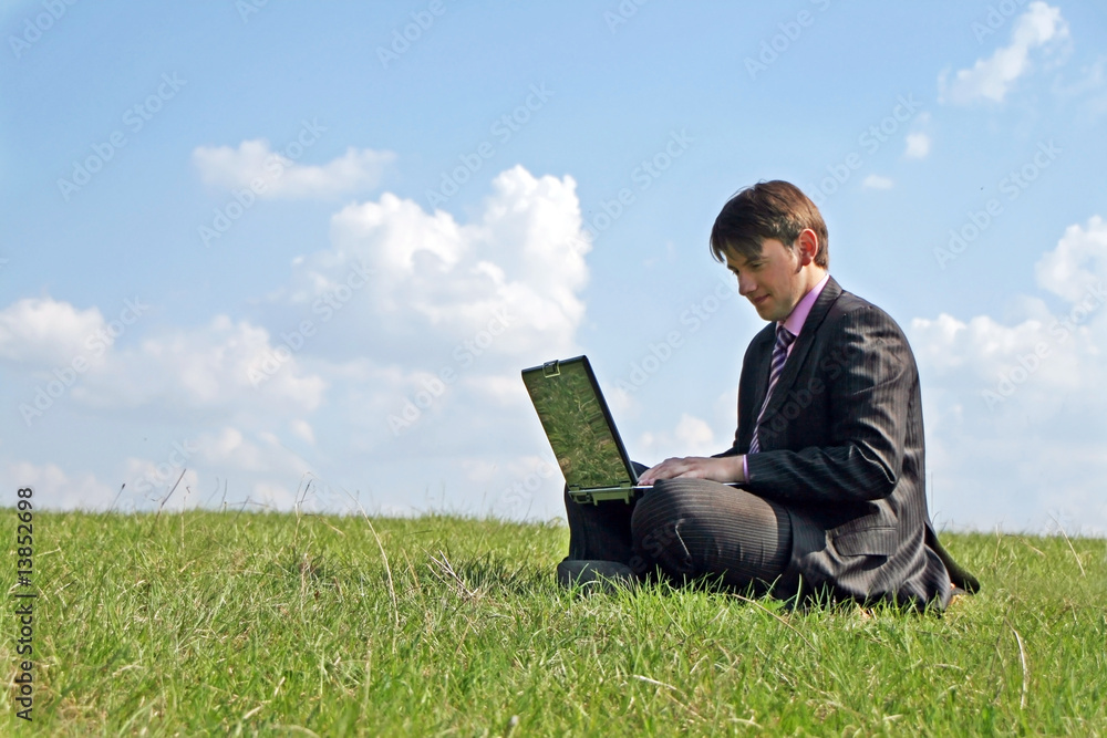 Businessman working with a laptop outdoor Businessman working with a laptop outdoor
