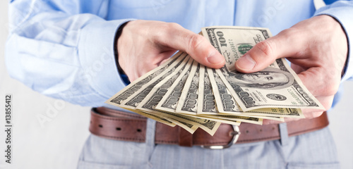 Money in the hands of the businessman