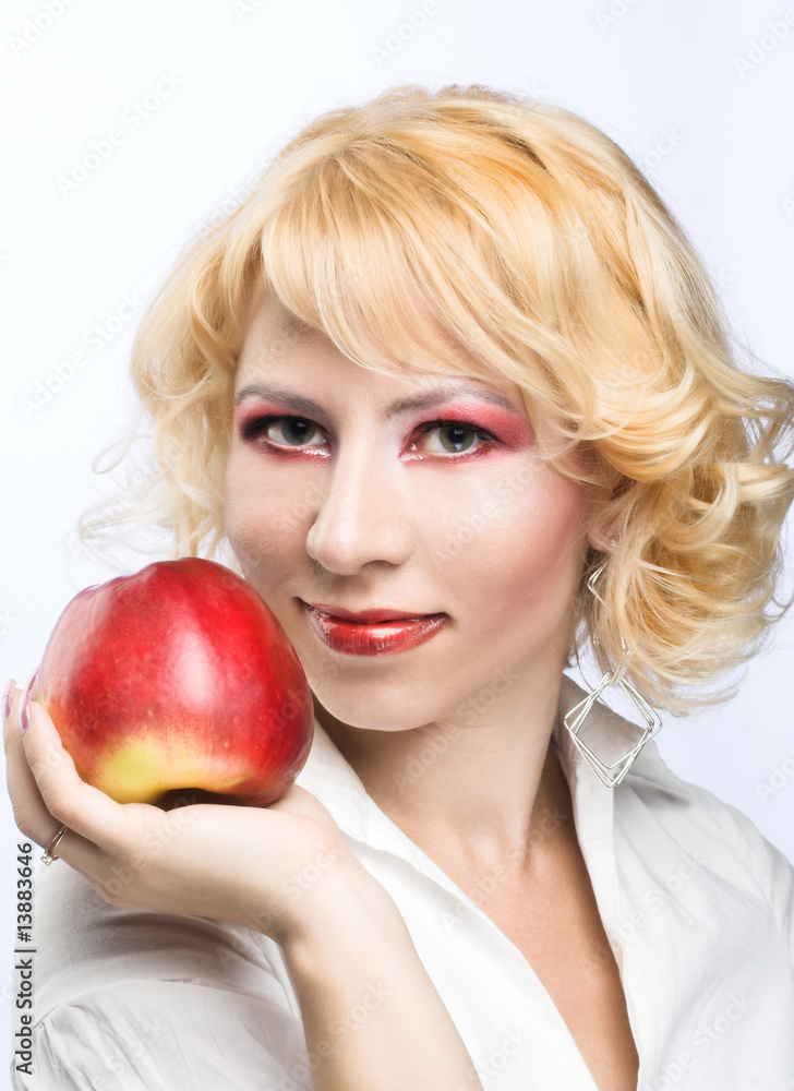 Portrait of young woman with red apple Portrait of young woman with red apple