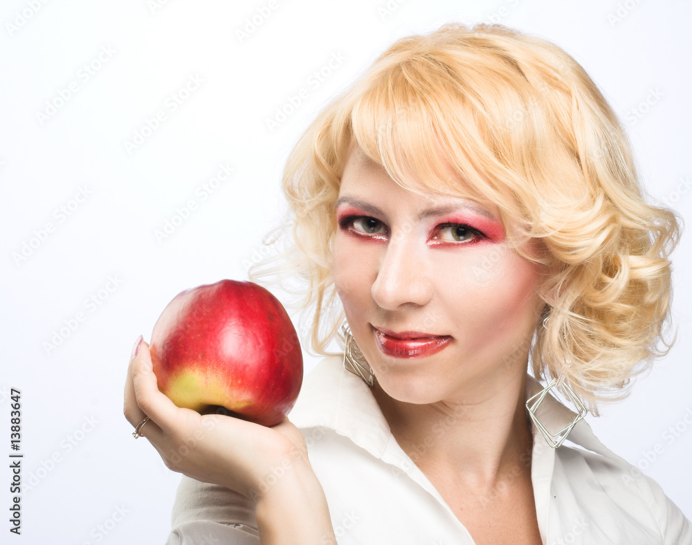 Portrait of young woman with red apple Portrait of young woman with red apple