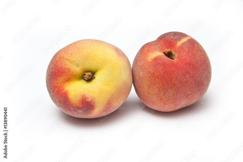 Peaches isolated on a white studio background. Peaches isolated on a white studio background.