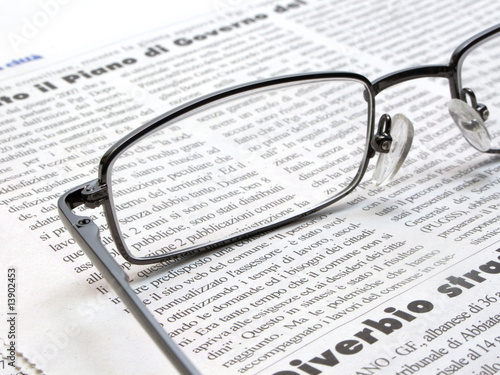 Newspaper with glasses