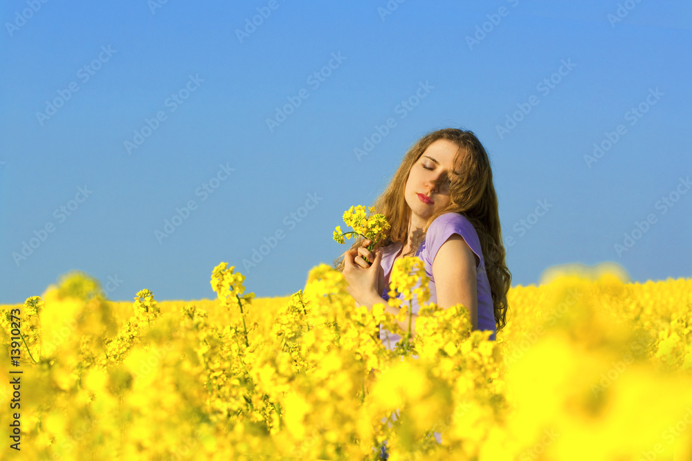 woman in rape(canola) field woman in rape(canola) field