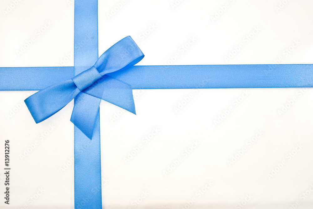 Gift satin blue ribbon bow on white background Gift satin blue ribbon bow on white background