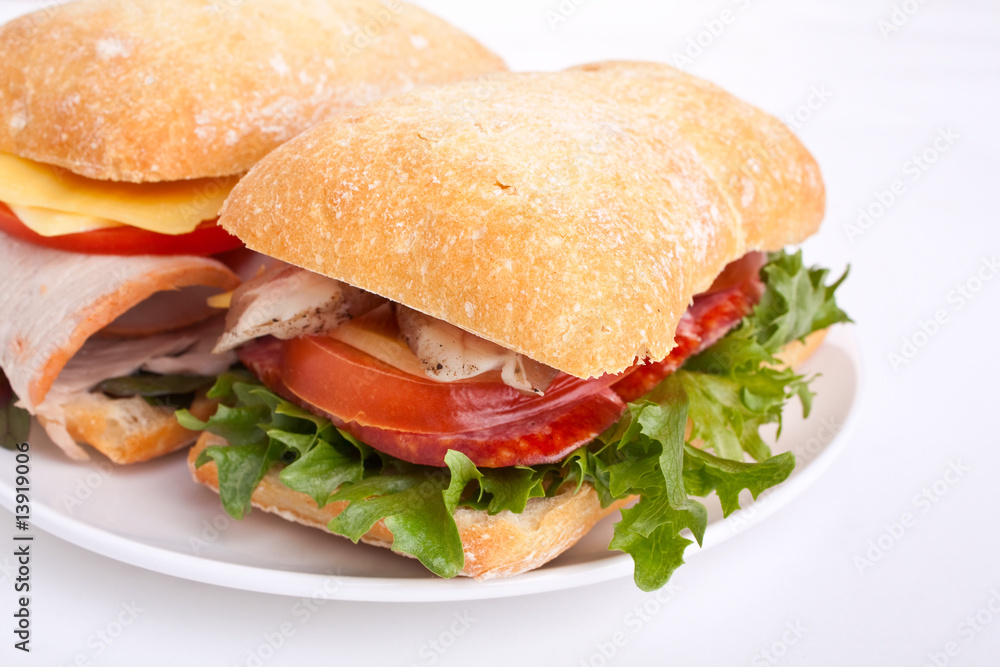 Ciabatta bread sandwiches stuffed meat,cheese and vegetables Ciabatta bread sandwiches stuffed meat,cheese and vegetables