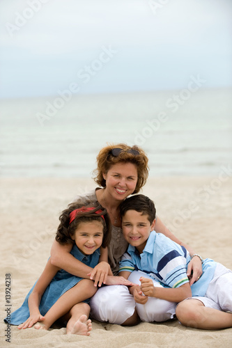 Mother and kids on the beach