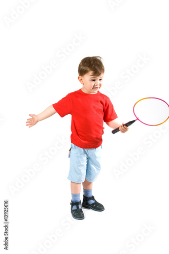 Little boy playing badminton