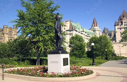 A commemorative statue in a park photo