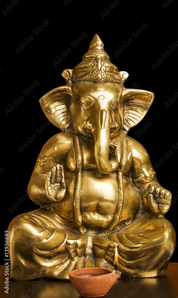 Golden Idol of Lard Ganesh on Black Background