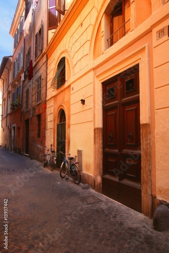 Bicycles on street in front of Buildings Rome Italy