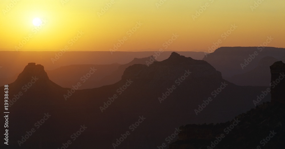 Sun setting over Grand Canyon buttes, Grand Canyon National Park