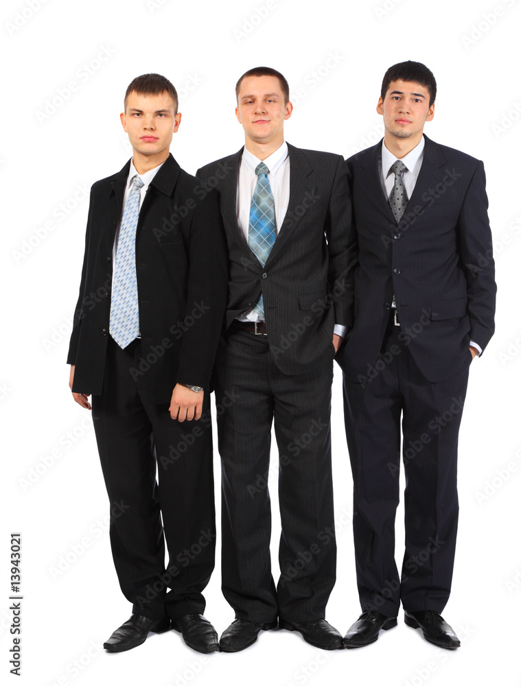 Three standing young businessmen