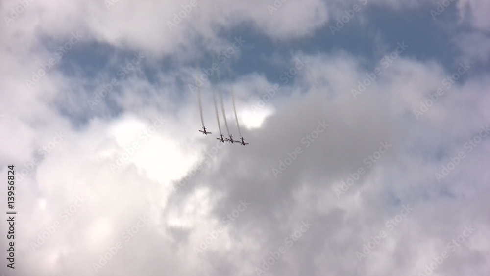 Groupo flying against cloudy sky Groupo flying against cloudy sky