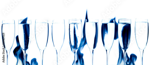 Set of crystal glasses and blue smoke