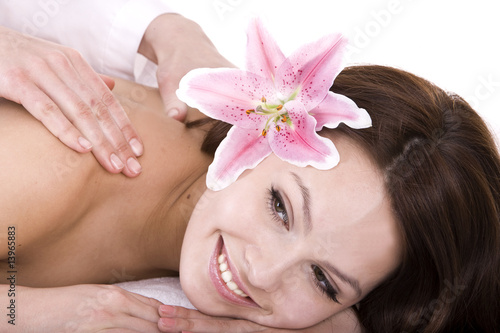 Beautiful girl on spa massage.Isolated.