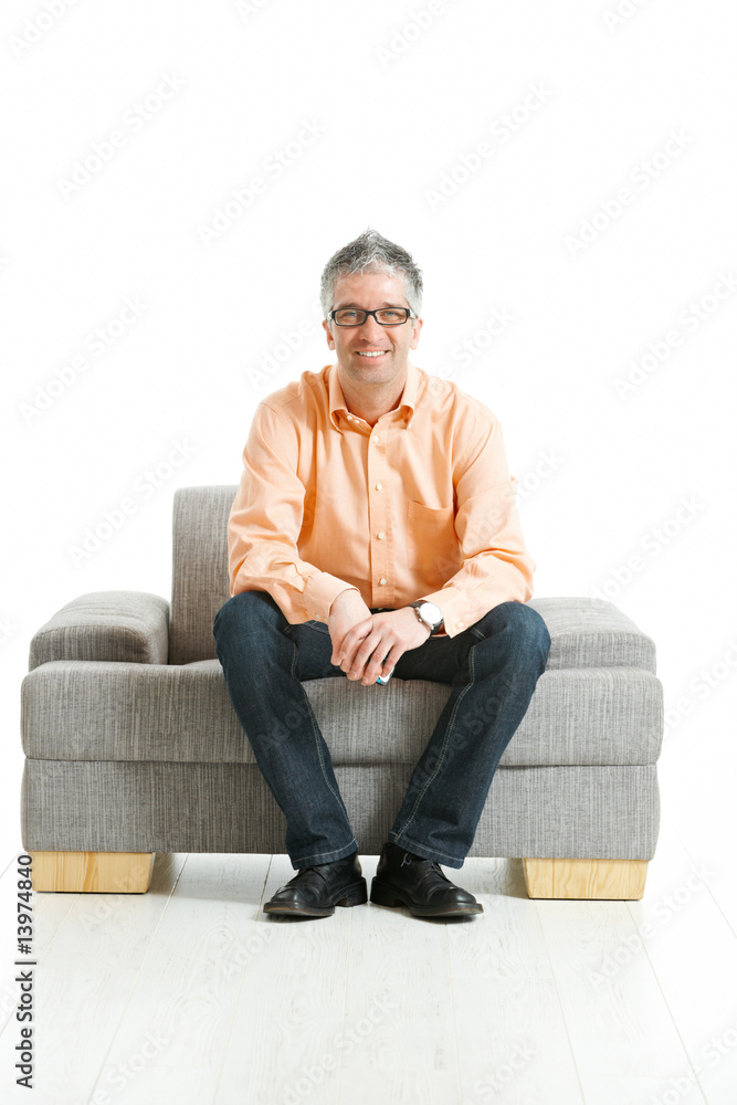 Man sitting on couch Man sitting on couch
