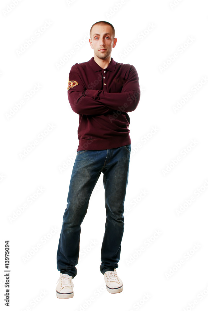 a happy young man in jeans and a shirt on a white background a happy young man in jeans and a shirt on a white background