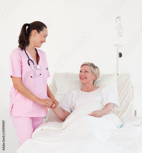 Nurse with an elderly patient