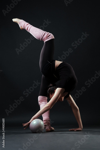 lovely gymnast with ball