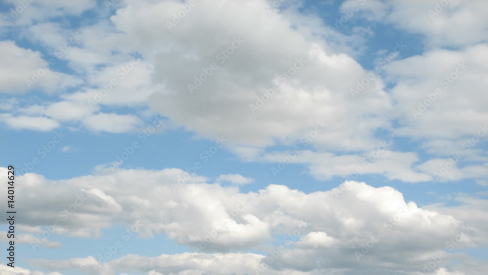 Time lapse clip of white fluffy clouds over blue sky Time lapse clip of white fluffy clouds over blue sky