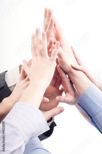 Hands of a successful business team on a white background photo
