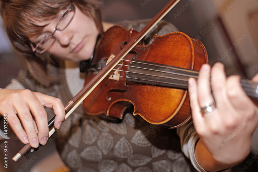 Woman plays the violin for home music Woman plays the violin for home music