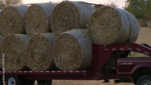 Trucks Hauling Hay Bales