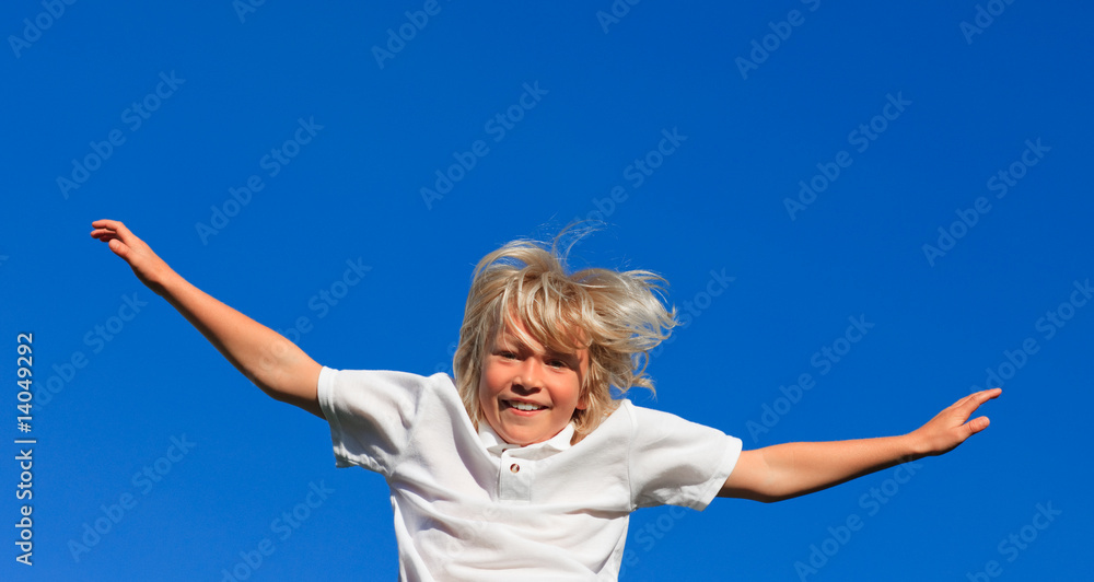 Boy jumping in the air Boy jumping in the air