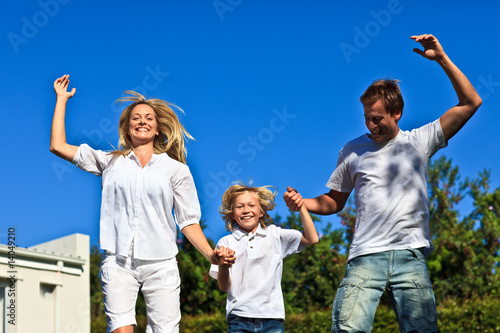 Family jumping in the air