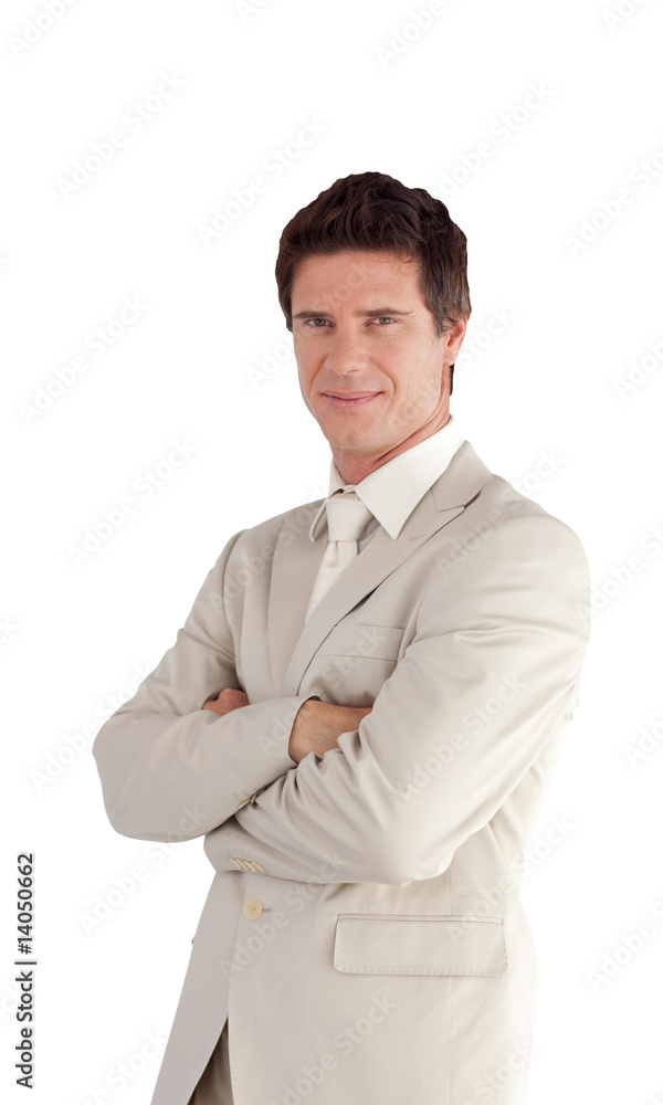 Businessman with folded arms isolated against white Businessman with folded arms isolated against white