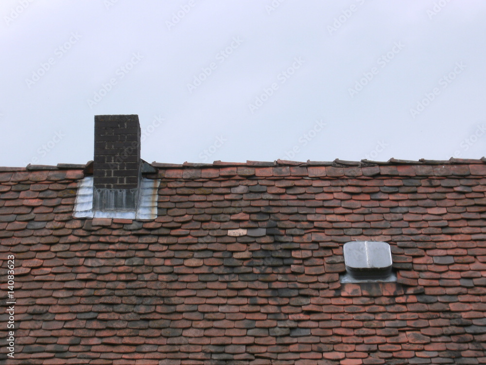 Fototapeta premium dachfenster und schornstein