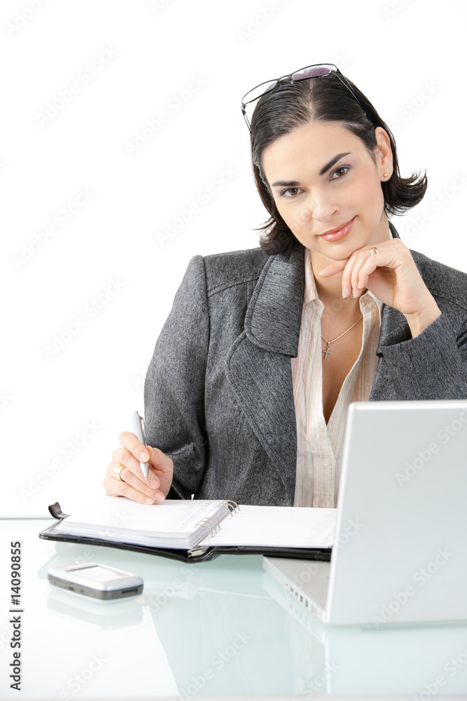 Businesswoman working at desk Businesswoman working at desk