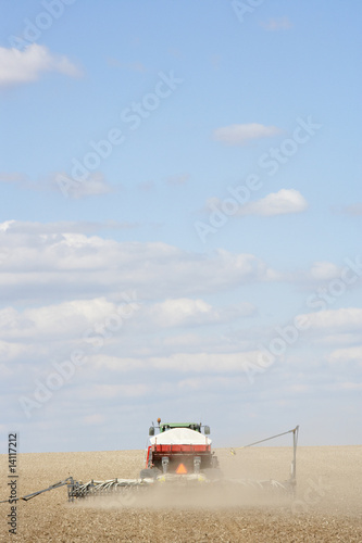Tractor Planting Seed In Field © Monkey Business