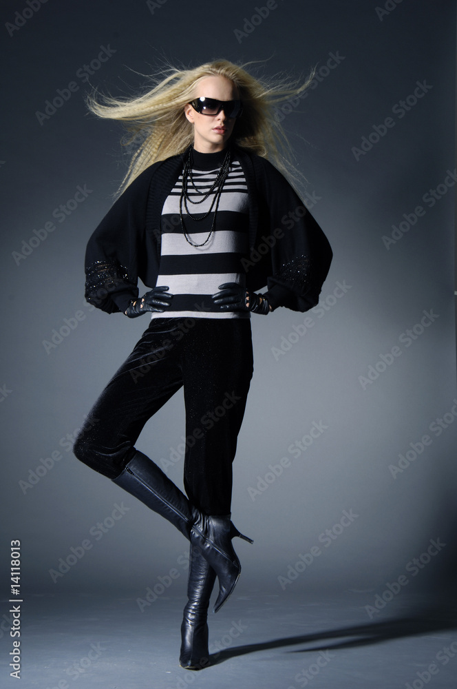 fashion model with long hair on light background fashion model with long hair on light background