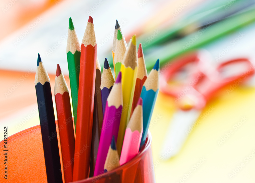 colored pencils in red glass colored pencils in red glass