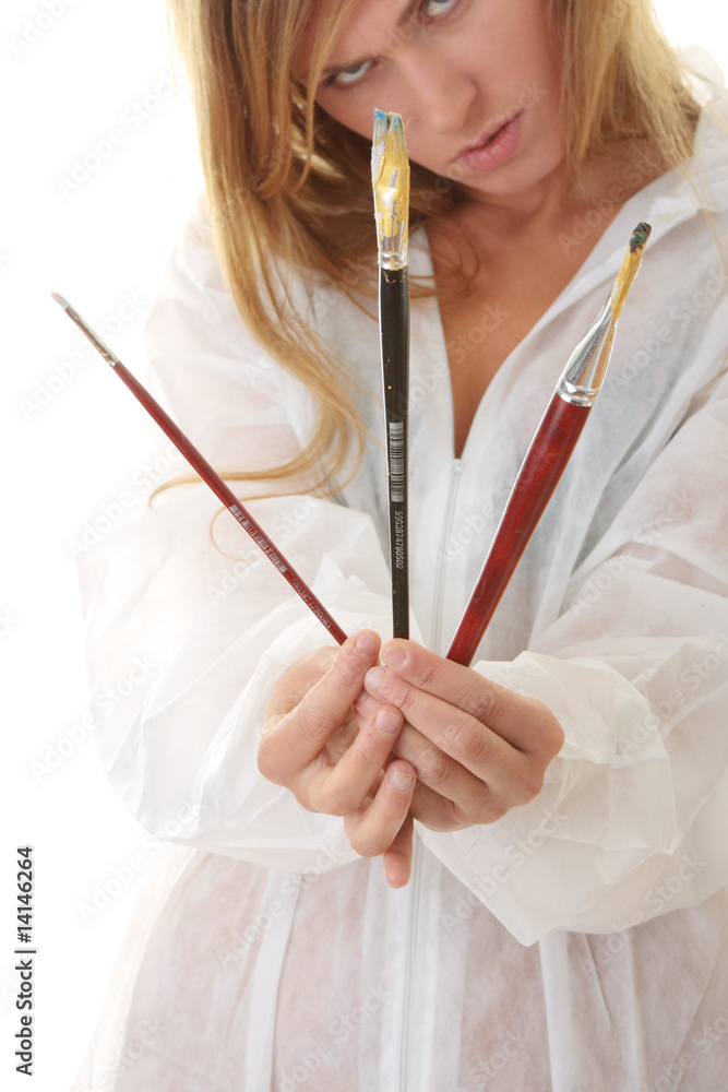 A female blond artist in white uniform A female blond artist in white uniform