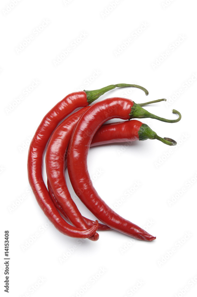 Three hot red chili peppers, isolated on white background