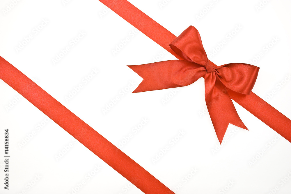Gift packaging with red ribbons and bow isolated on white Gift packaging with red ribbons and bow isolated on white