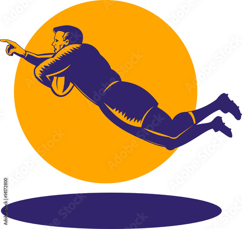 Rugby player scoring a try